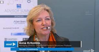 Photo of Anne Kritzmire speaking on AssetTV