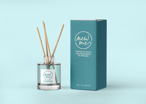 Oil diffuser with New Me Retreat Branding and Identity