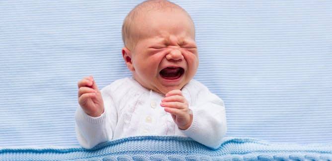 Newborn crying. Cluster feeding. Newborn breastfeeding. Baby awake all night