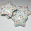 Thumbnail: Small collection of star shaped porcelain pocket stone with rainbow polka dots. Top view.