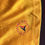 Thumbnail: Yellow t-shirt with company logo graphic on sleeve