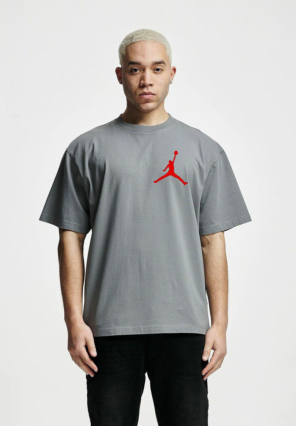 Thumbnail: grey t-shirt with graphic print focused on football