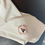 Thumbnail: White t-shirt with print of company logo on sleeve