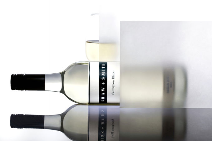 Creative wine image of shaw and smith Sauvignon Blanc on a light background