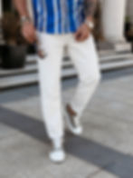 Męskie jeansy z prostą nogawką w kolorze light beige, zapięcie na logowany guzik, naszywka OLAVOGA denim wear z tyłu