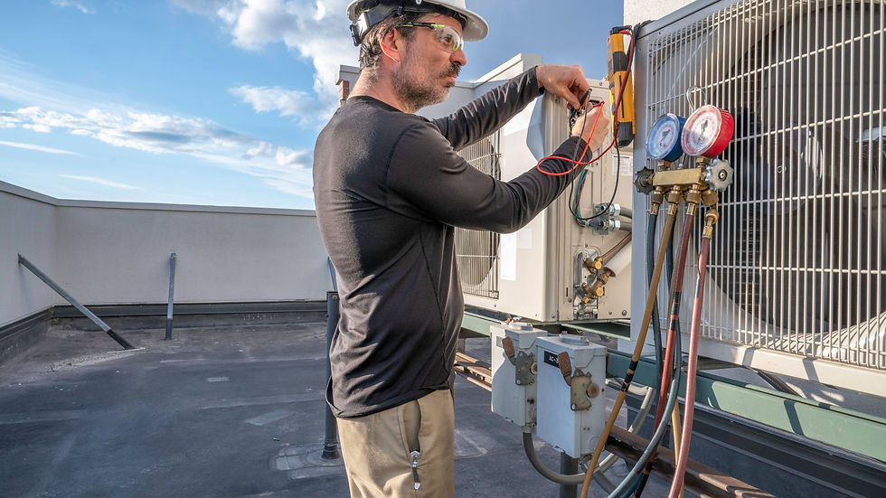 HVAC technician taking electrical measurements of the system to validate performance