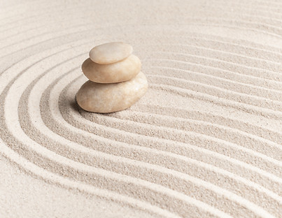 stacked-zen-marble-stones-sand-background-mindfulness-concept.jpg