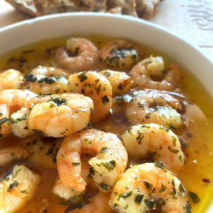 Garlic Prawns in a hot Agave, mustard and chilli oil, served with a garlic rubbed olive sourdough