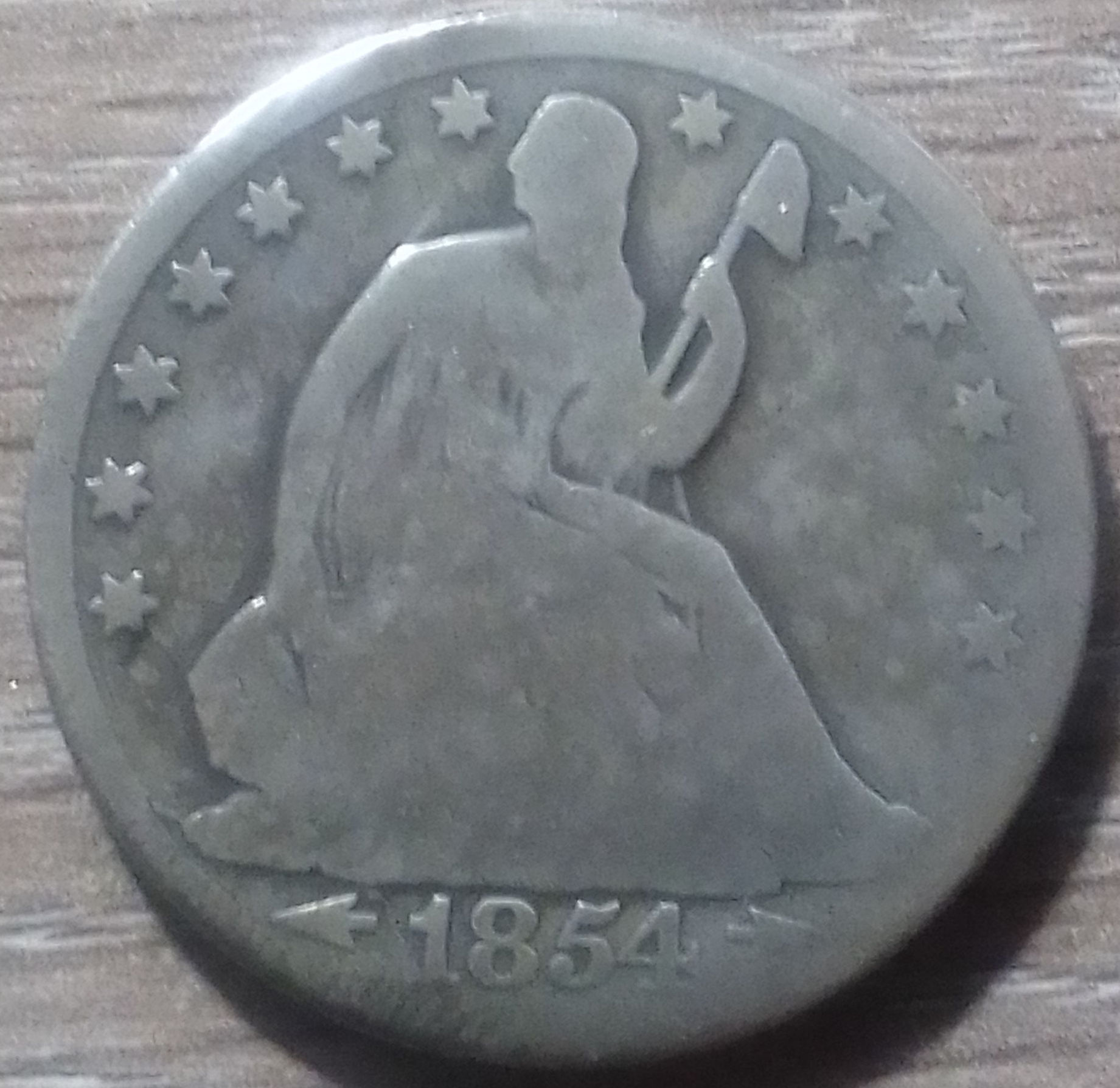 1854 O Silver Seated Liberty Half Dollar with Double Die on"United "and "America