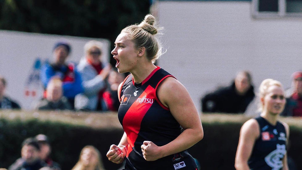 Daria Bannister celebrates a goal against Carlton. Photo - bigfooty.com