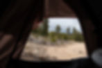 View of Colorado mountains out of a Madix Truck Camper.