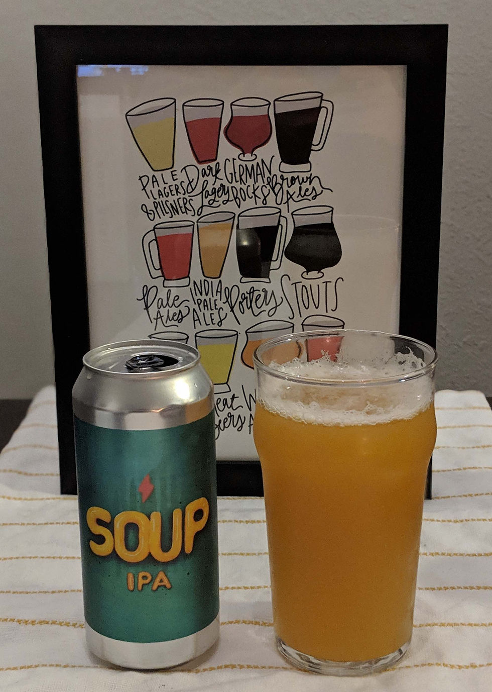 Soup IPA can next to beer glass