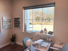 A clean and inviting nail salon interior with manicure station