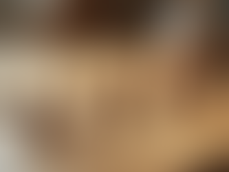 Different nail shapes displayed on a wooden surface