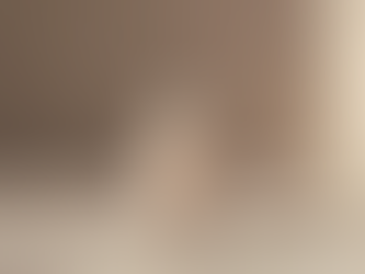 A close-up view of a nail polish bottle showcasing a neutral shade