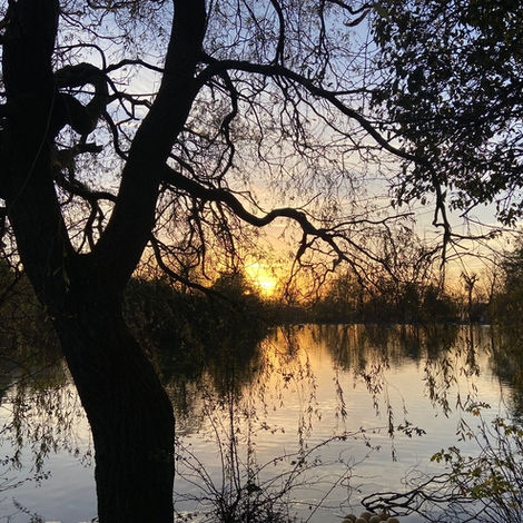 Sunset over the boating lake in Saltwell Park Gateshead.