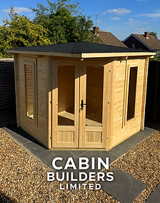 Dunster House Coronet Corner timber cabin with glazed double doors, side windows and a dark roof.