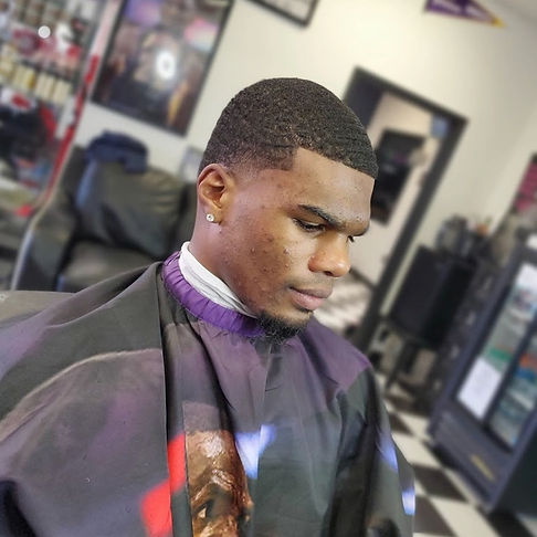 Men's Haircut skin taper with waves on top sharp lineup