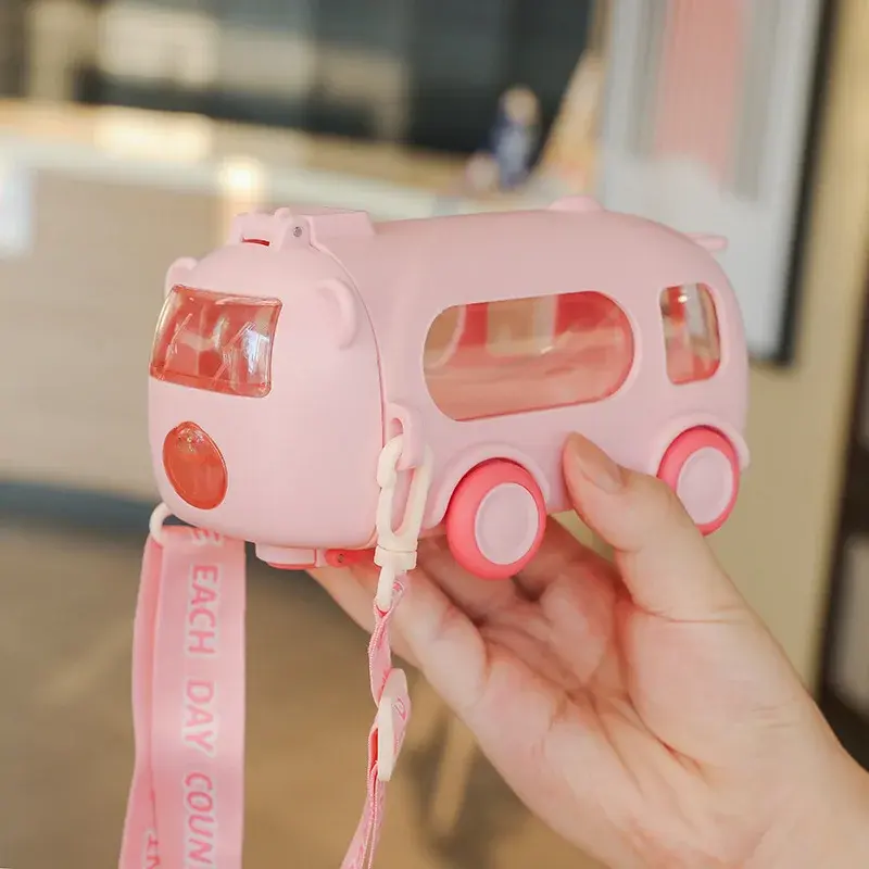 Pink bus shaped kids water bottle with straw and sling – school sipper for children in India