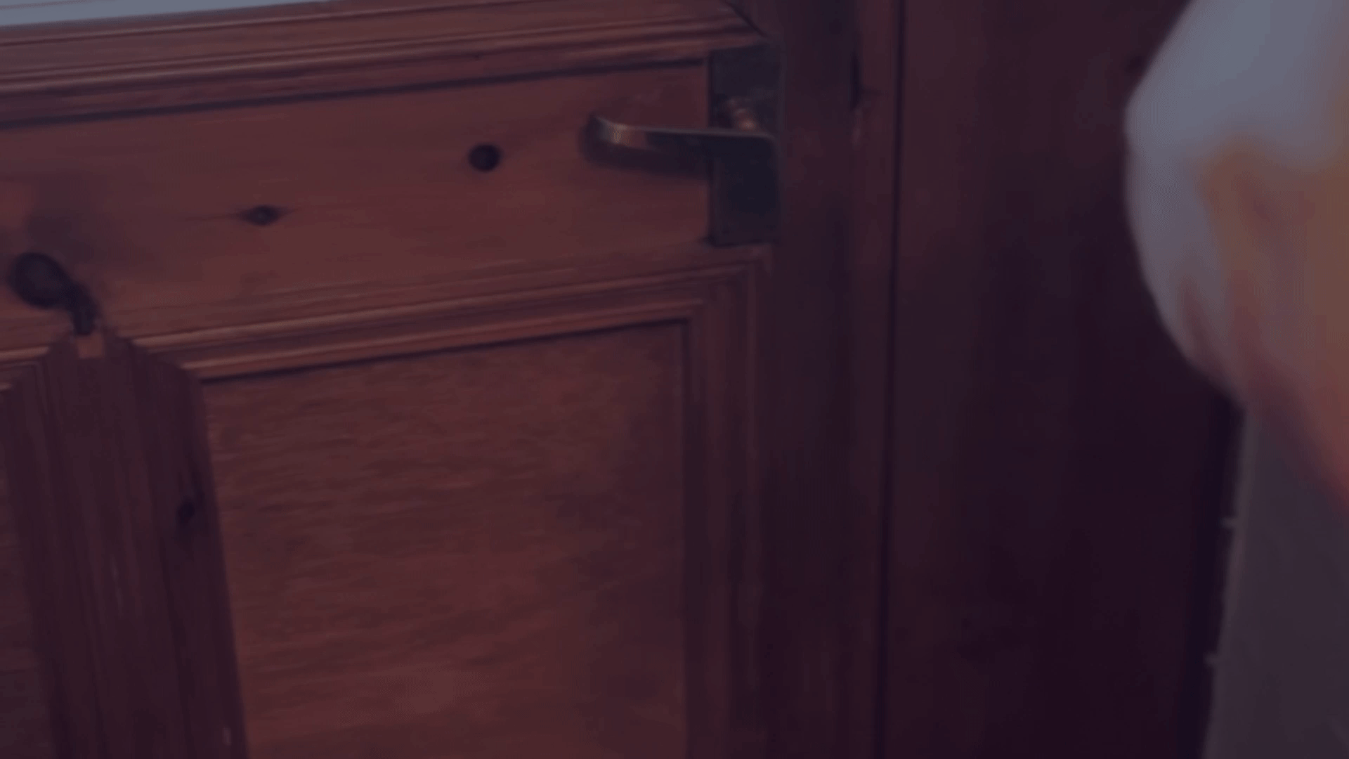 Gif of gas engineer handing a business card to customer