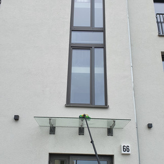 Baureinigung Glasvordach mit Osmose