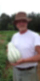 Farmer Charlie with a Kushaw squash
