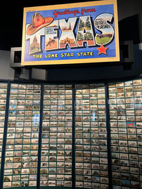 Postcards of Texas line a wall and come from nearly every corner of the state.