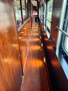 Narrow wooden walkway into the Club 41 train car