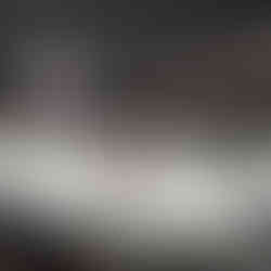 Two Zambonis on the ice as the smooth things over before the puck drops