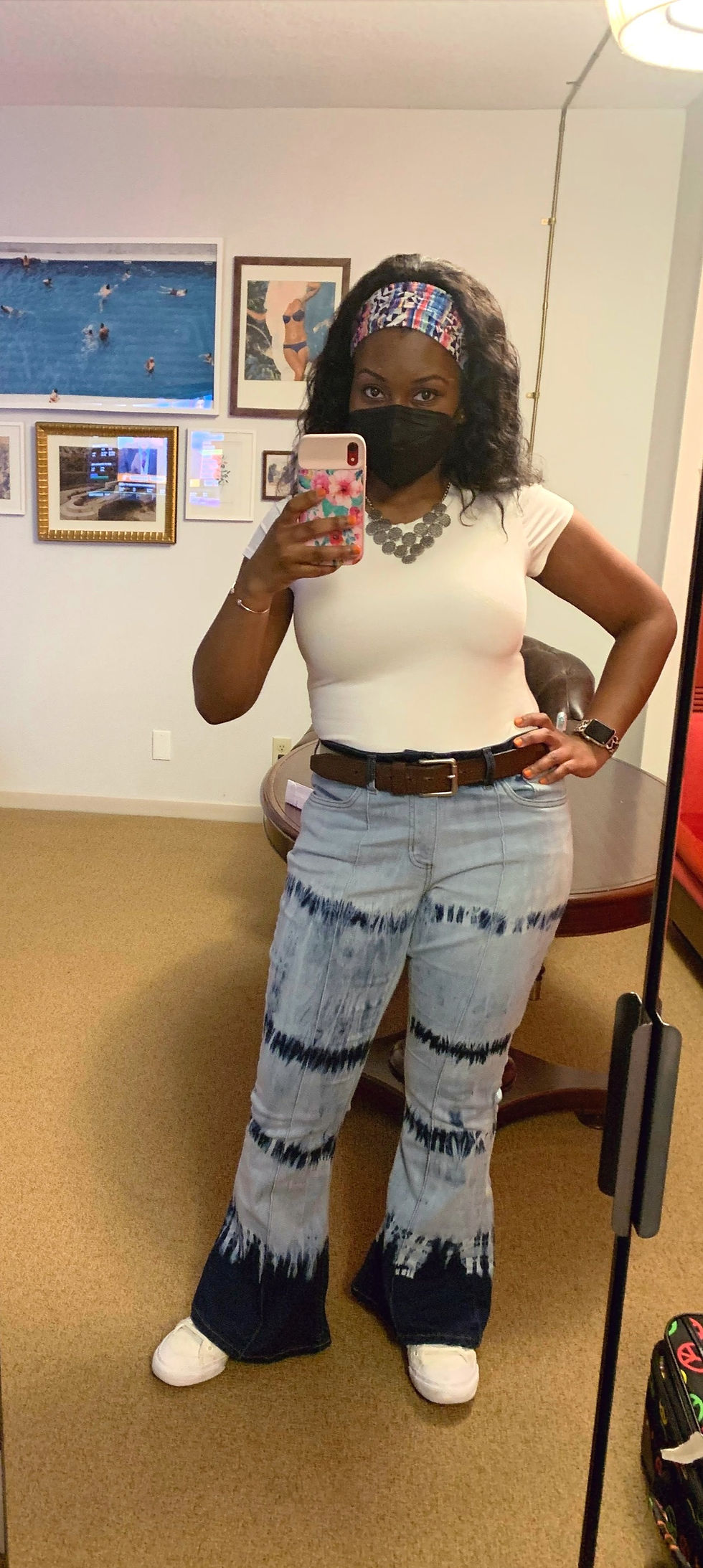 Plain white t-shirt and blue tie dye bellbottoms