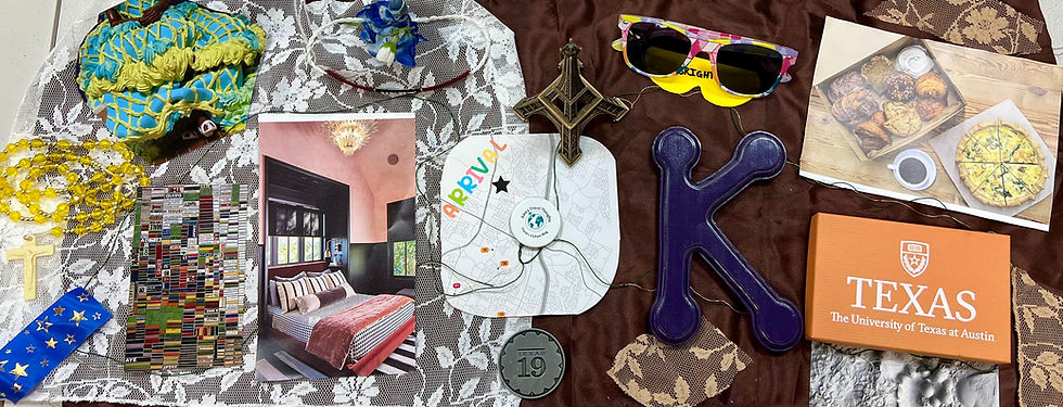 Various items on lace and brown fabric, including model Eiffel Tower, colorful shades, map, beads, photos, and Texas packaging; text reads "ARRIVAL."