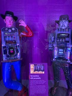 Slot machines with personality. The 2 slot machines are designed to look like cowboys.