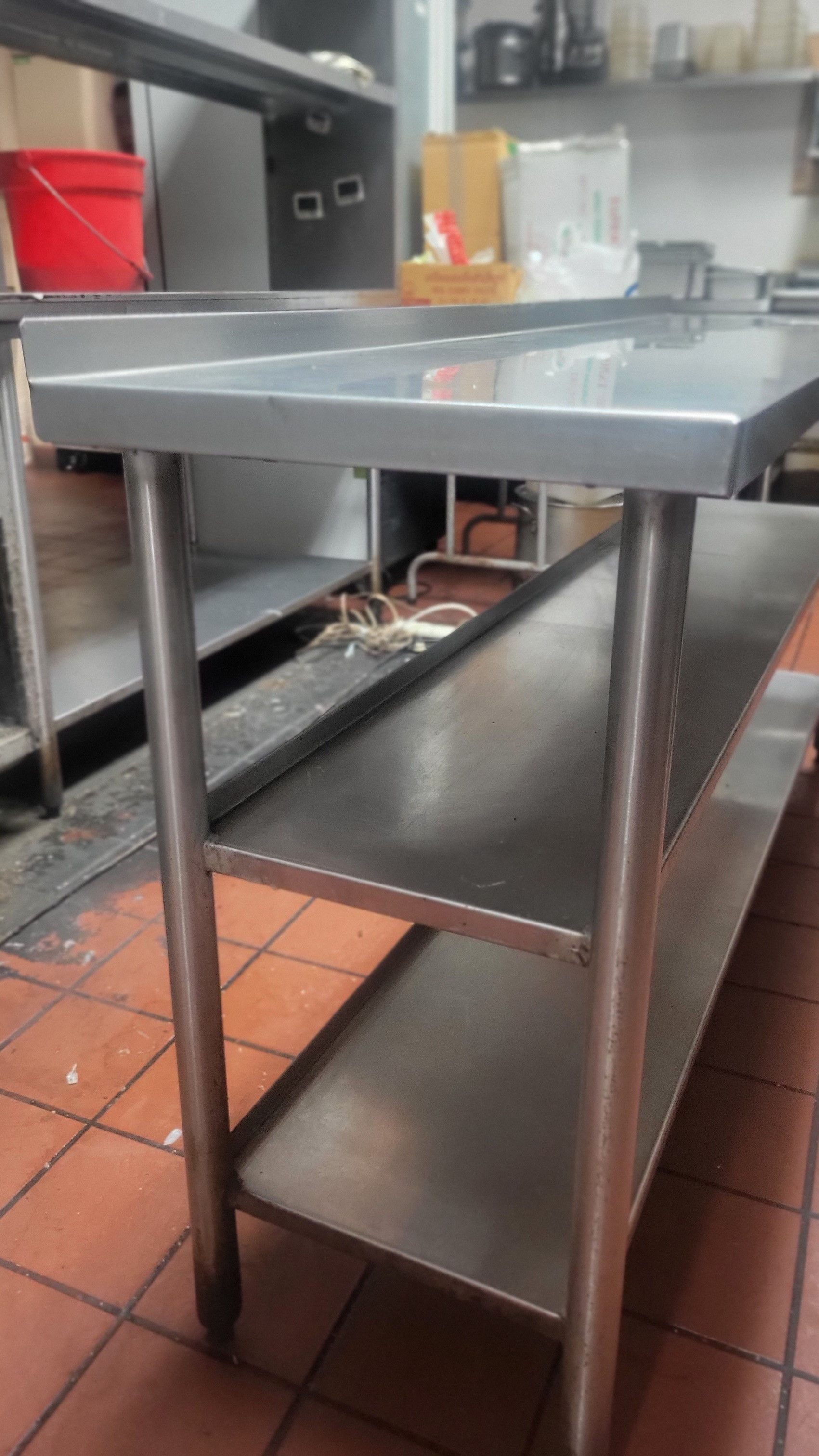 Stainless steel work table with 3 undercounter shelves