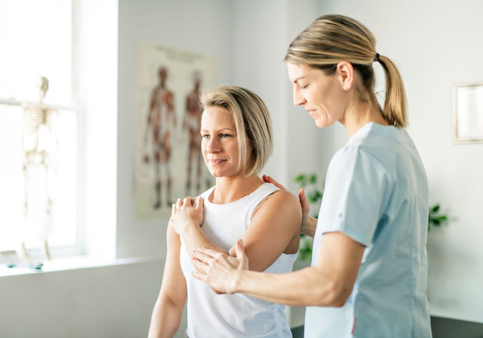 fisiotherapist working with patient