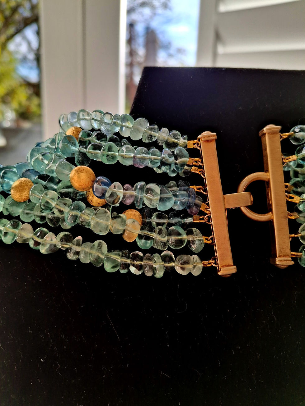 Thumbnail: Pale Blue Green Fluorite Clear Pebbles with 22K Gold Plated Diskser