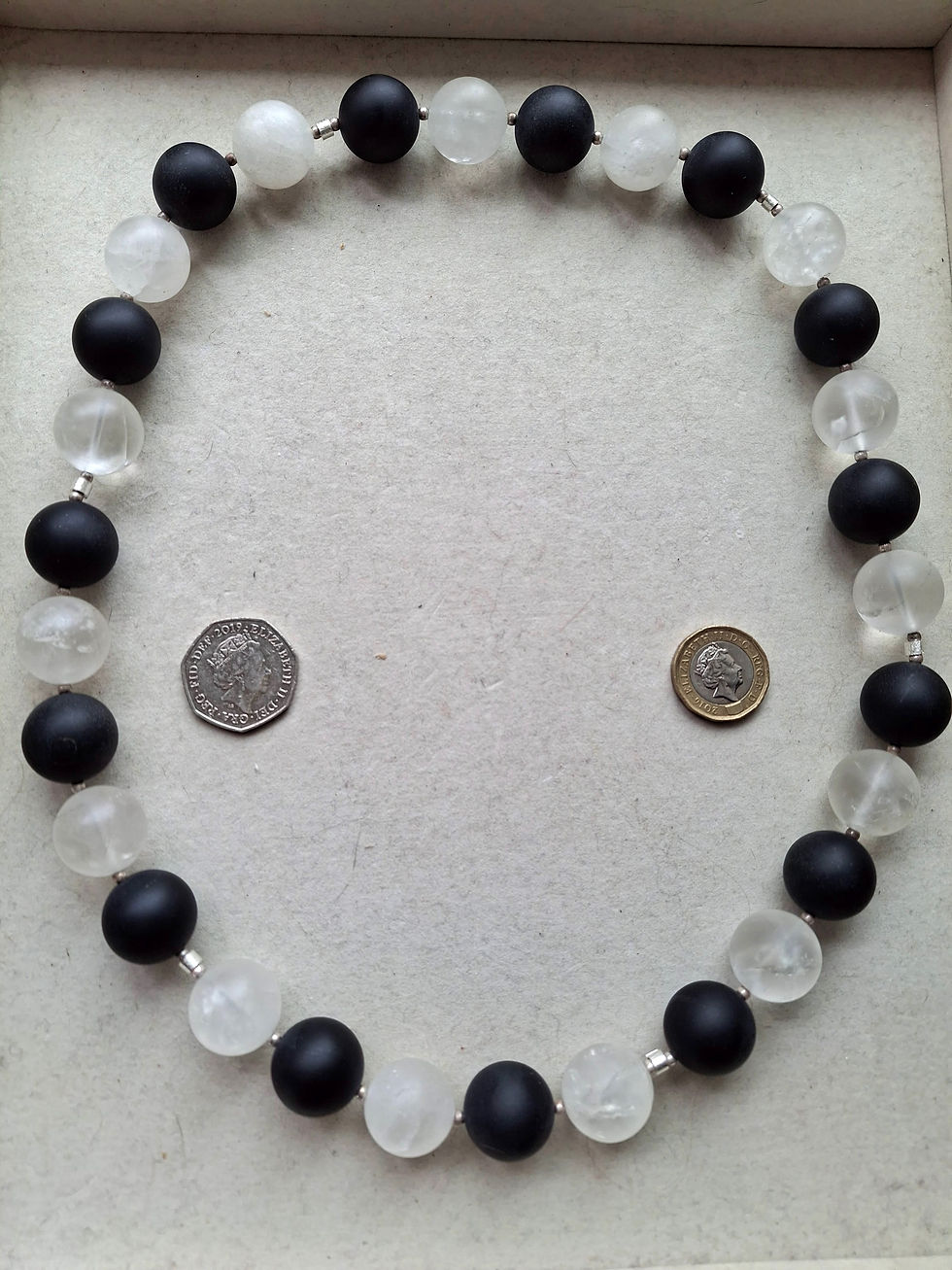 Thumbnail: Rock Crystal & Matt Black Onyx Beads.