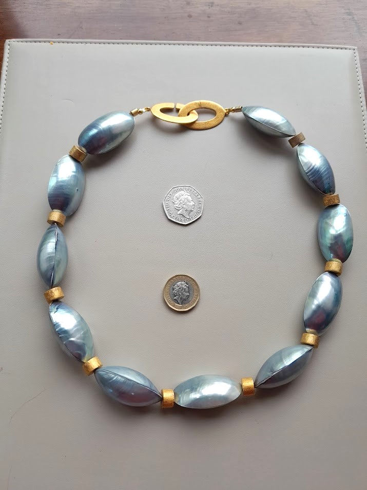 Thumbnail: Blue Nautilus Shell Necklace with 22K Gold Plated Sterling Silver Spacers