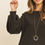 Thumbnail: Dark Brown Puff Sleeved Boat Neck Top Arm View