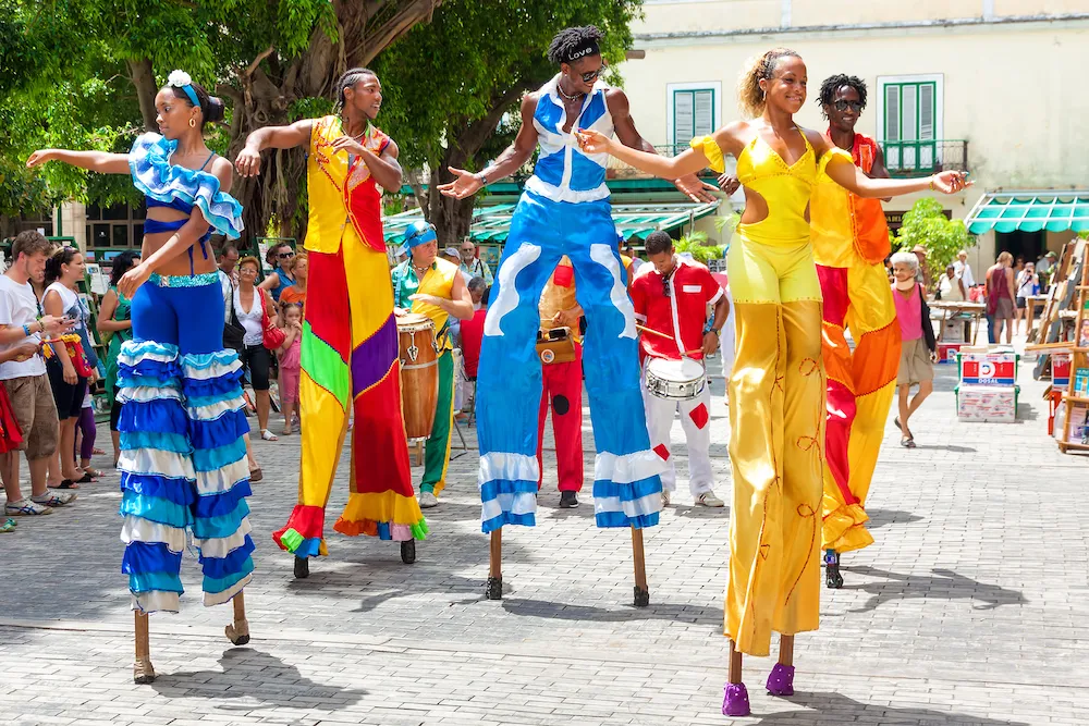 Dancers-on-Stilts-in-Old-Havana.jpg.webp