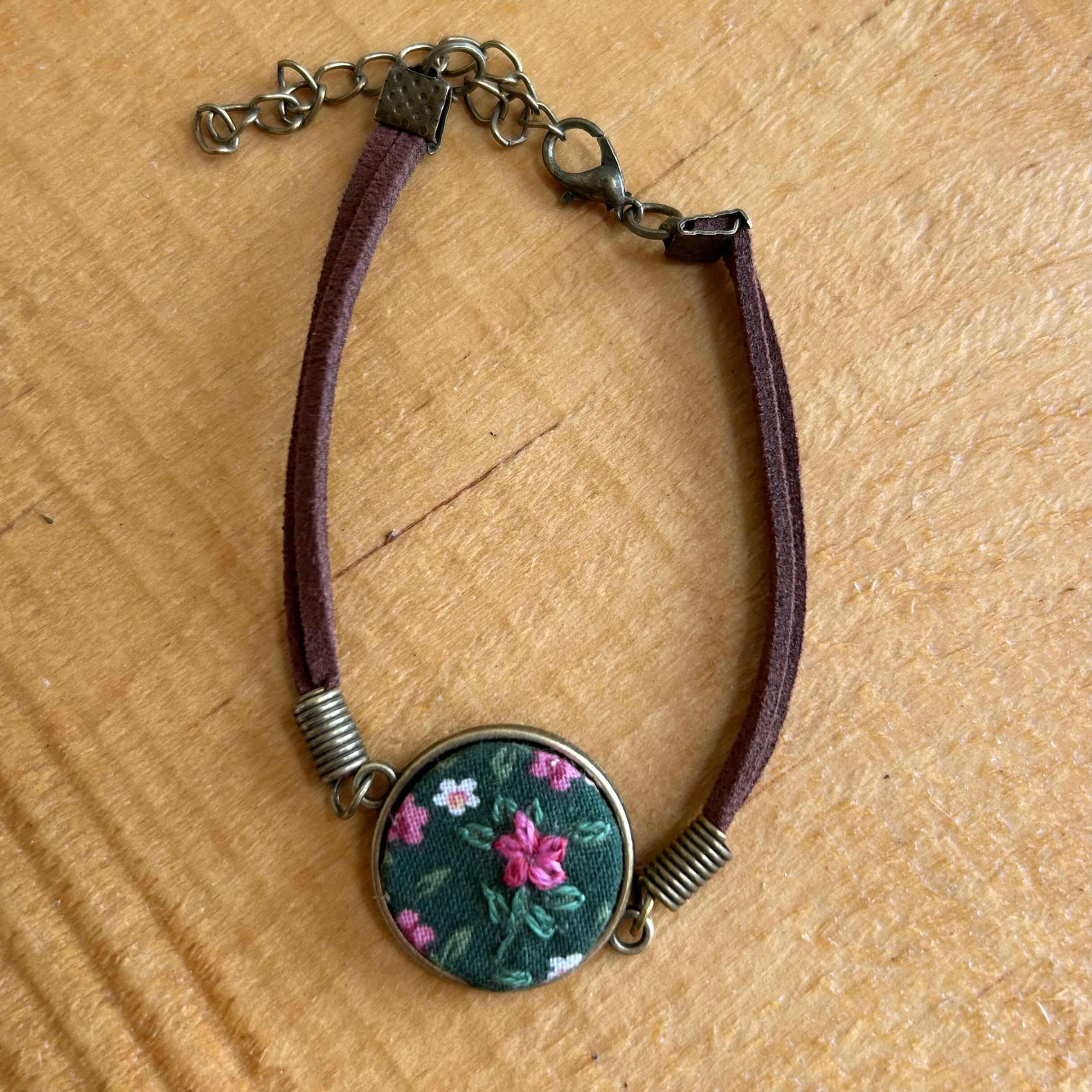 Pink on green embroidered bracelet