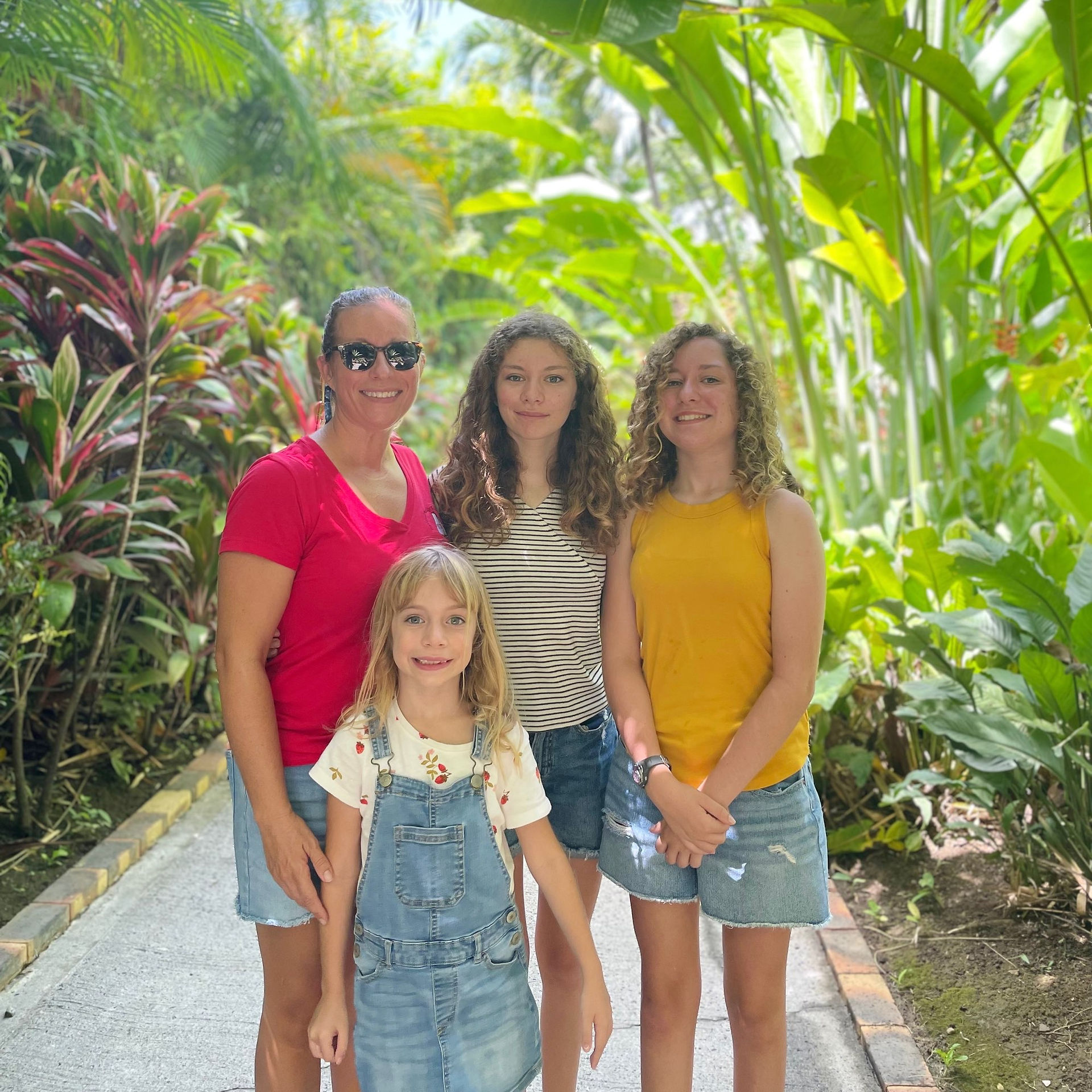 family enjoying sights at botanical garden in Deshaies, Guadeloupe