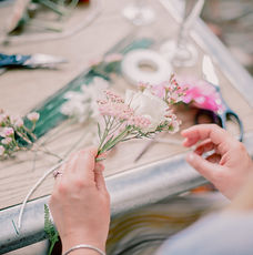 woman-making-decoration-with-flowers.jpg