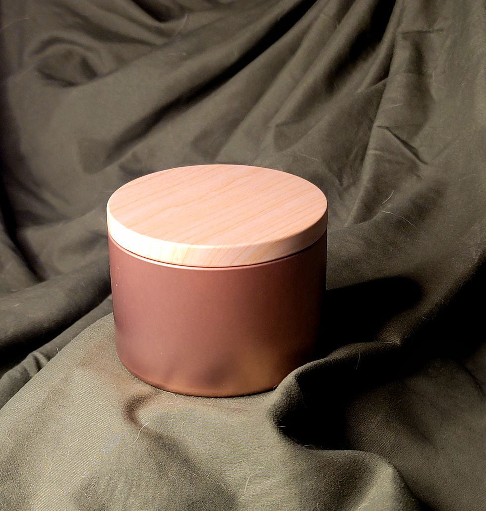 Red container with a wooden lid sits on a textured, green surface.