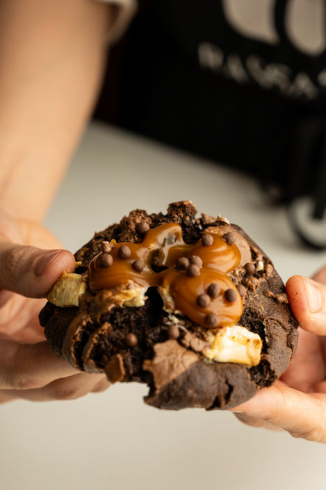 Chocolate cookie with caramel and chocolate chips.