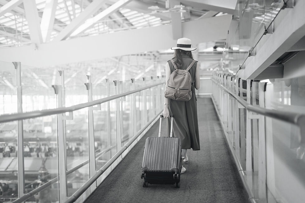 Traveler Walking In Airport_edited.jpg