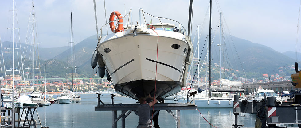 Marine surveyor inspecting hull of commercial vessel during compliance inspection in BC