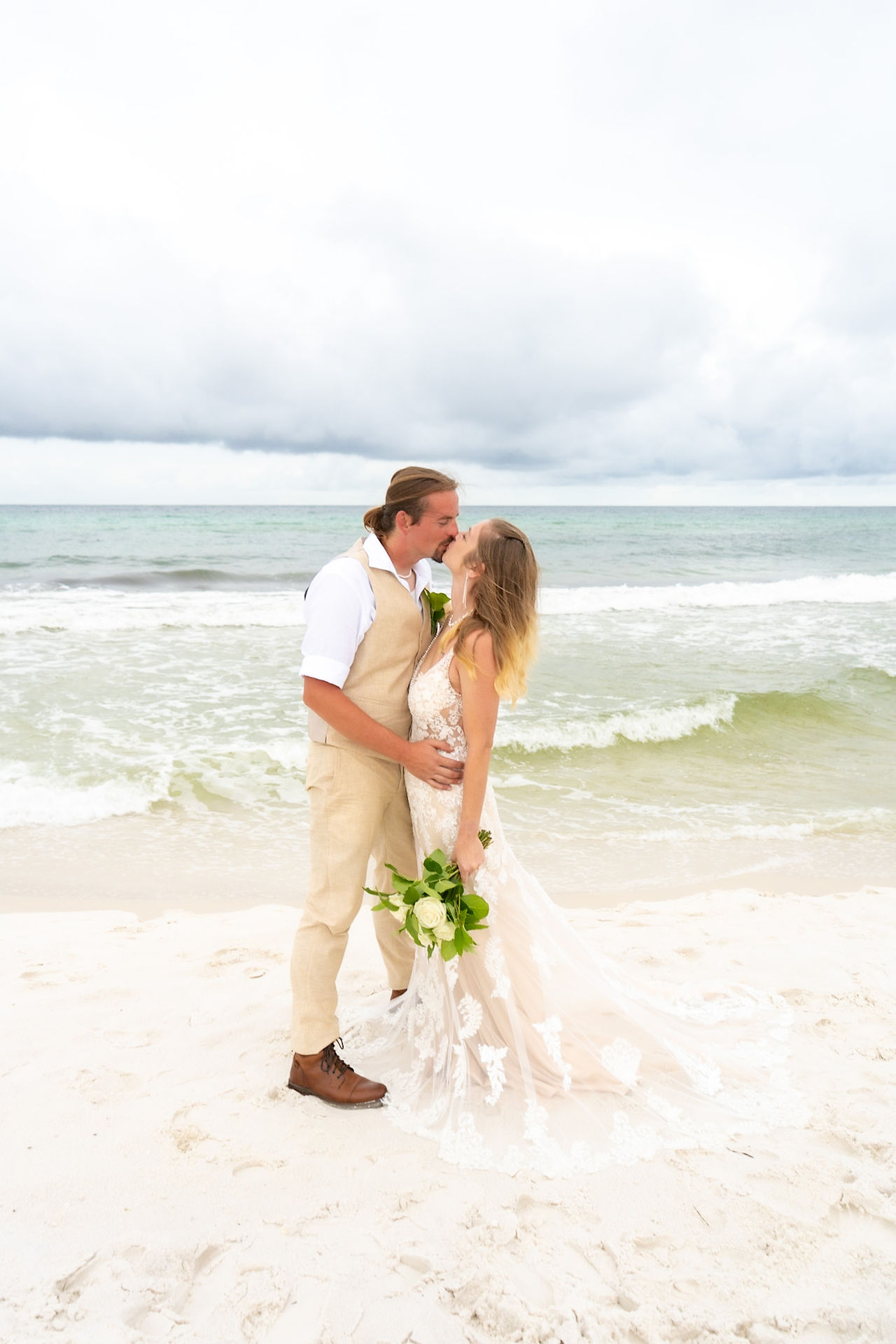 Couple kissing on the beach