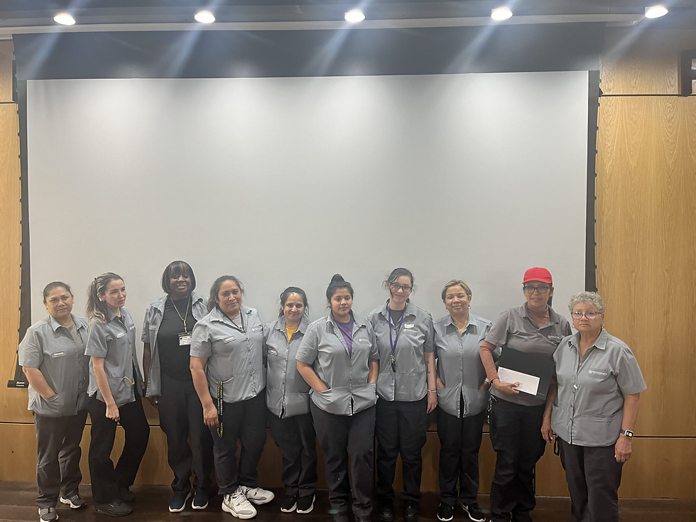 2024 housekeeping staff receiving the Community Builders Award | Photo via The Source