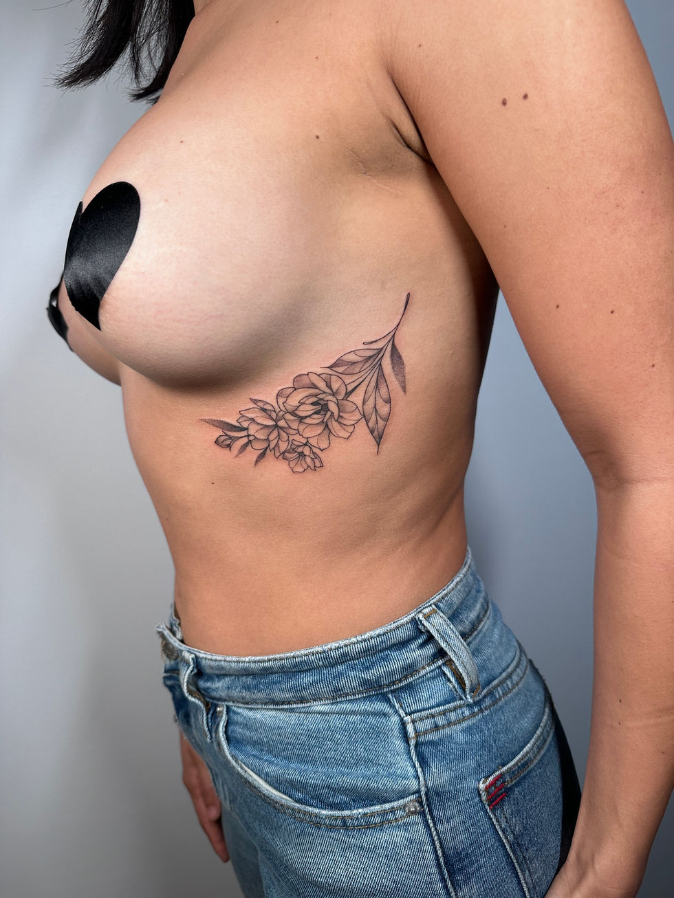 Floral Rib Tattoo
