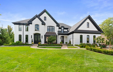 White brick estate in Prairie Lakes